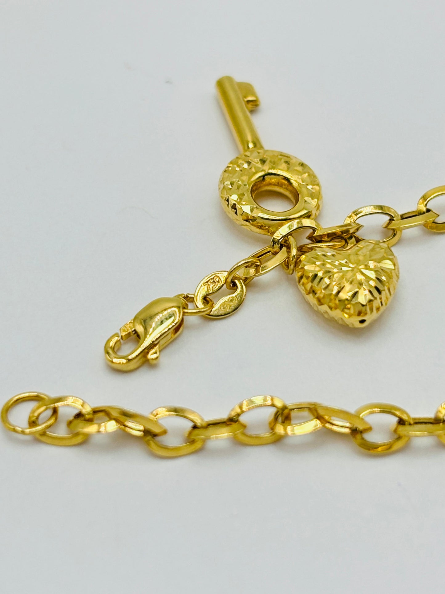 18K Gold with Heart & key Charm Bracelet
