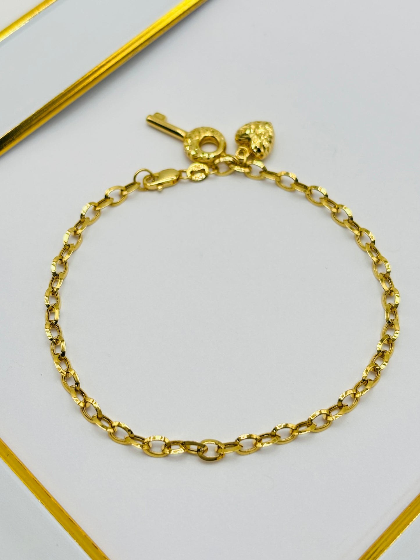 18K Gold with Heart & key Charm Bracelet