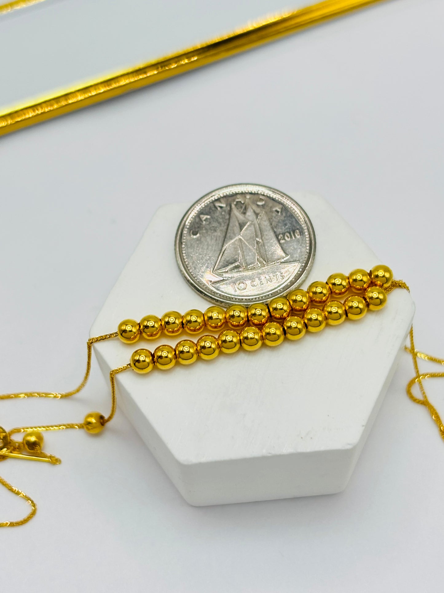 18K Gold Running Ball & Heart Charm Necklace