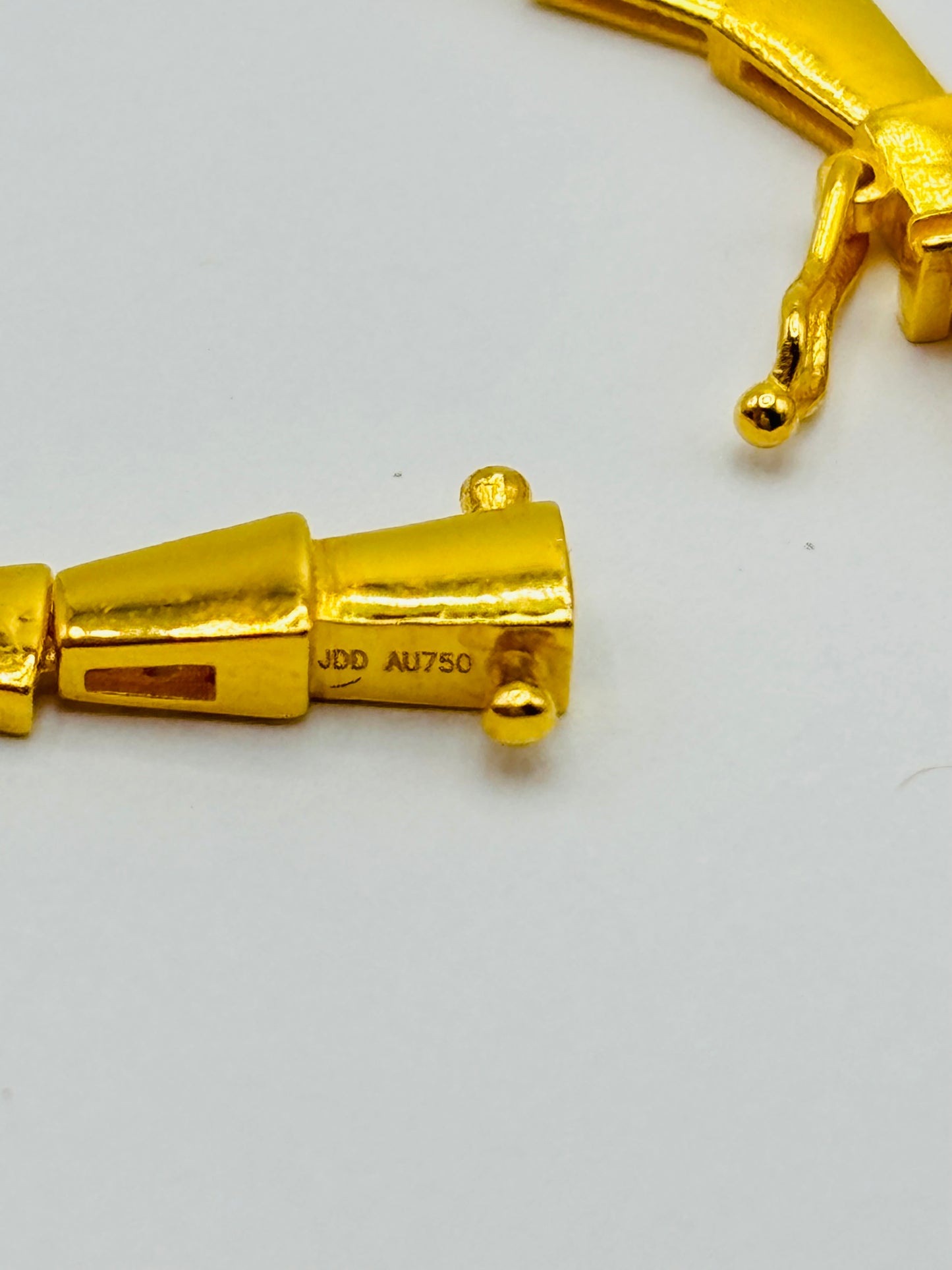 18K Gold Serpentine Triple Lock Bracelet