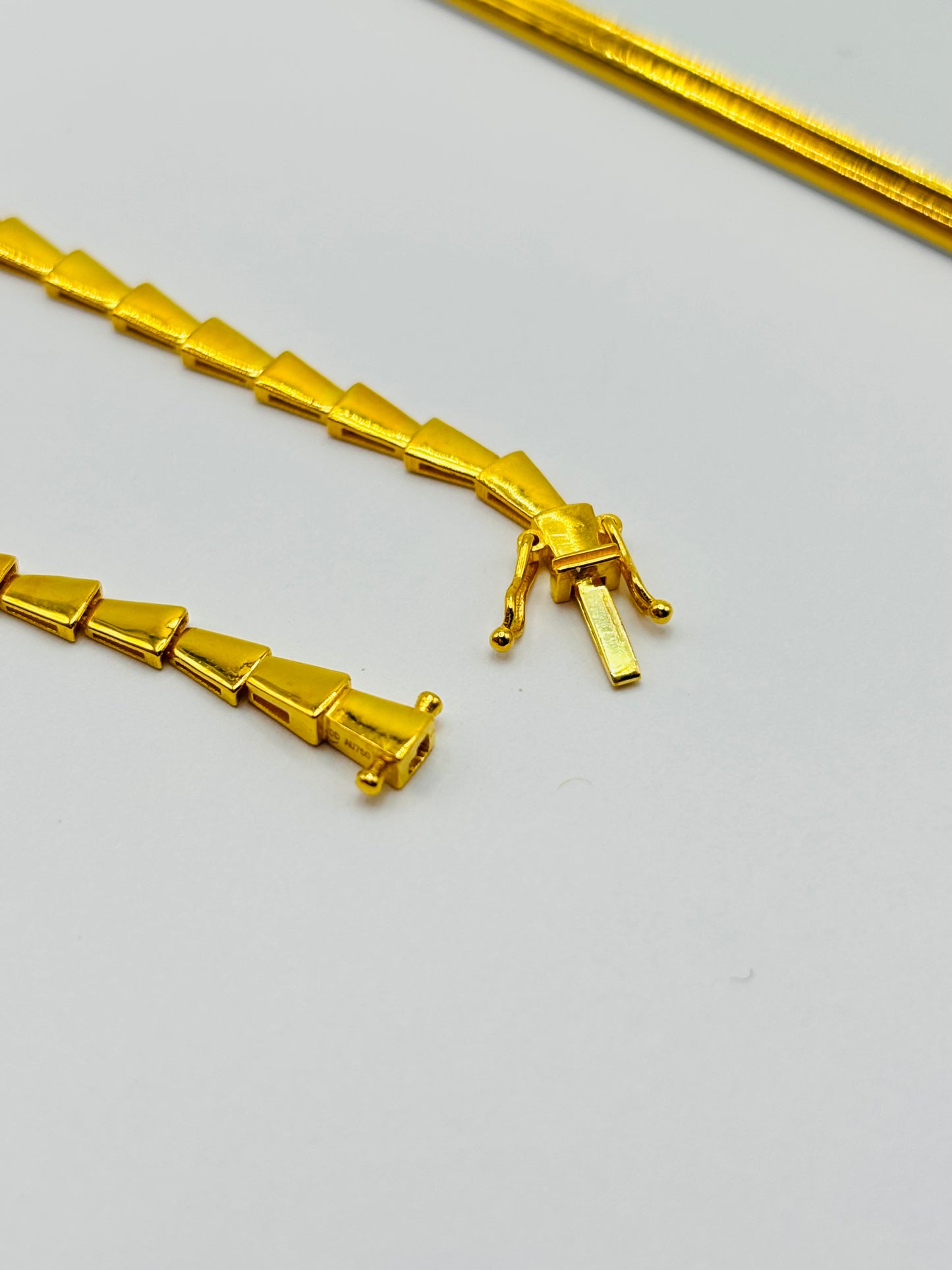 18K Gold Serpentine Triple Lock Bracelet