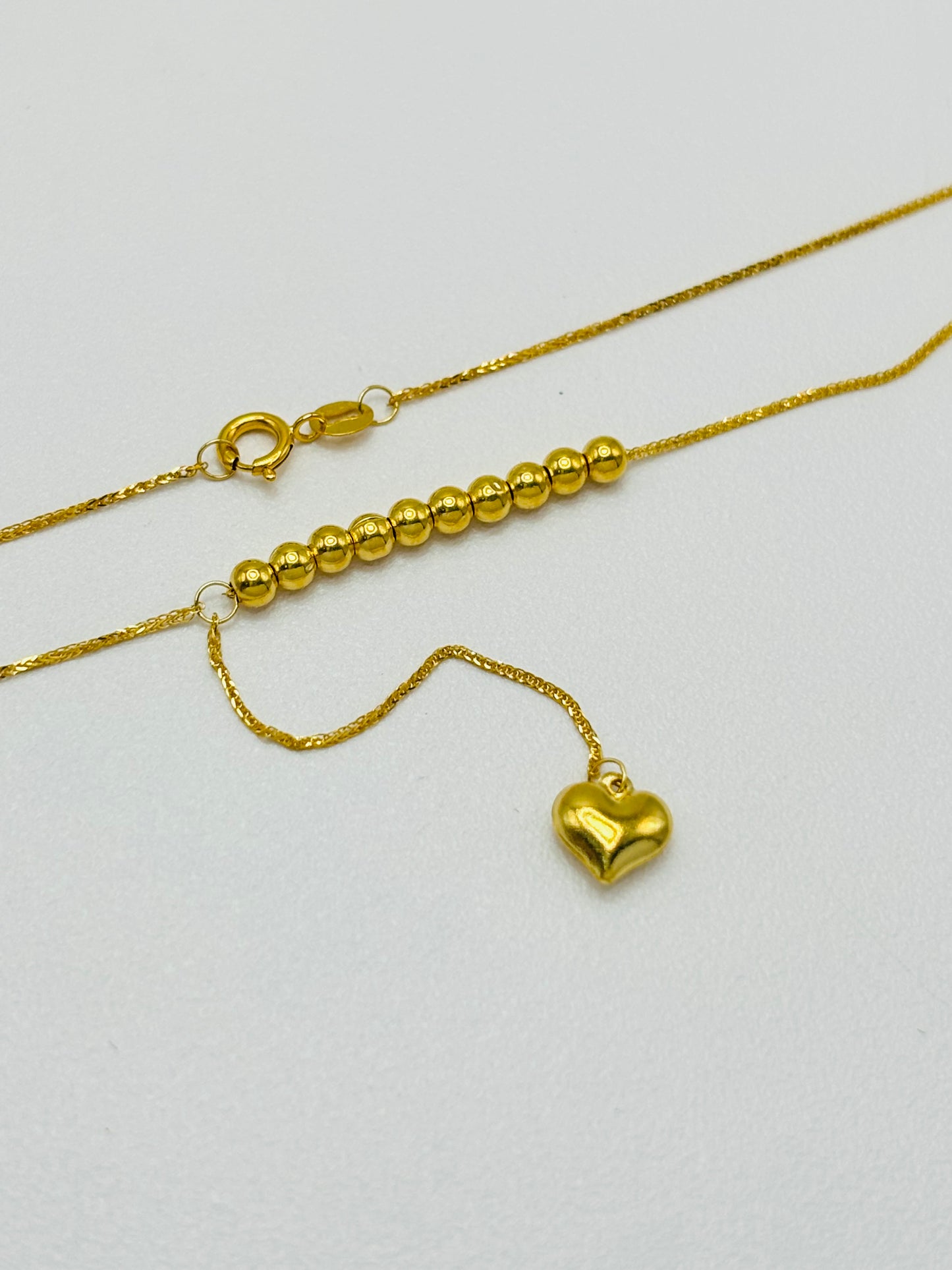 18K Gold Running Ball with Heart Necklace