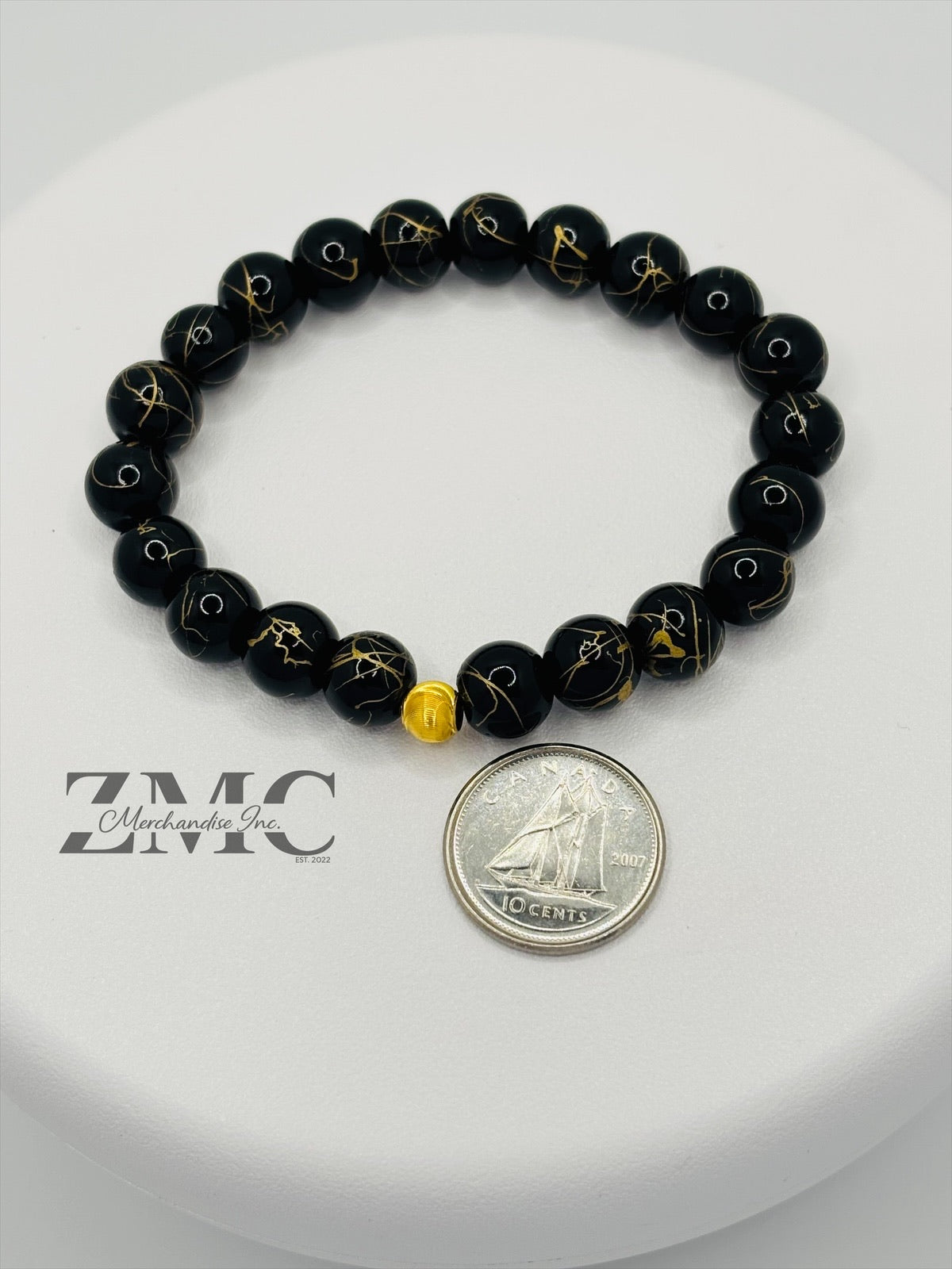18K Gold Cats Eye Ball with Black Gold Stone