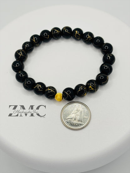 18K Gold Cats Eye Ball with Black Gold Stone