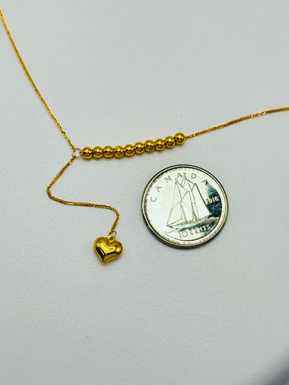 18K Gold Running Ball with Heart Necklace