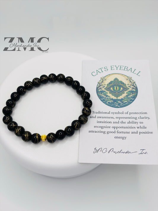 18K Gold Cats Eye Ball with Black Gold Stone