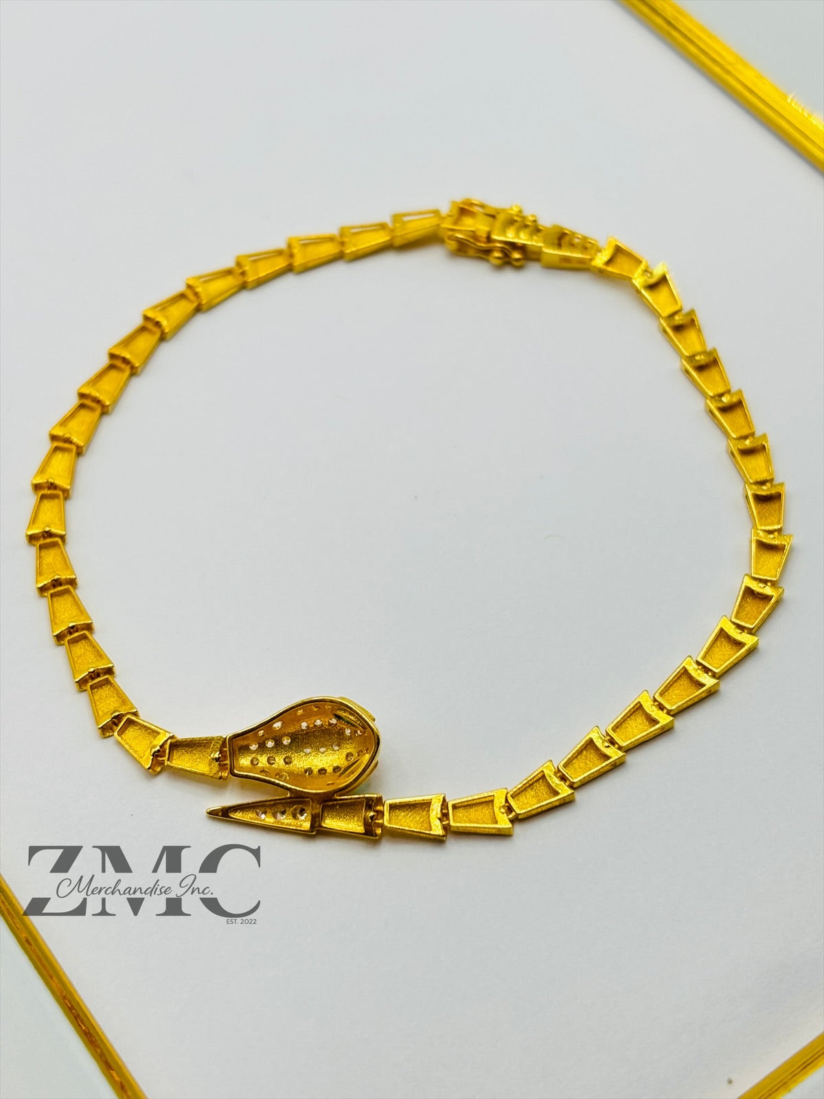 18K Gold Serpentine Triple Lock Bracelet