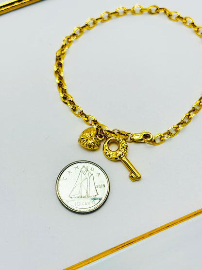 18K Gold with Heart & key Charm Bracelet