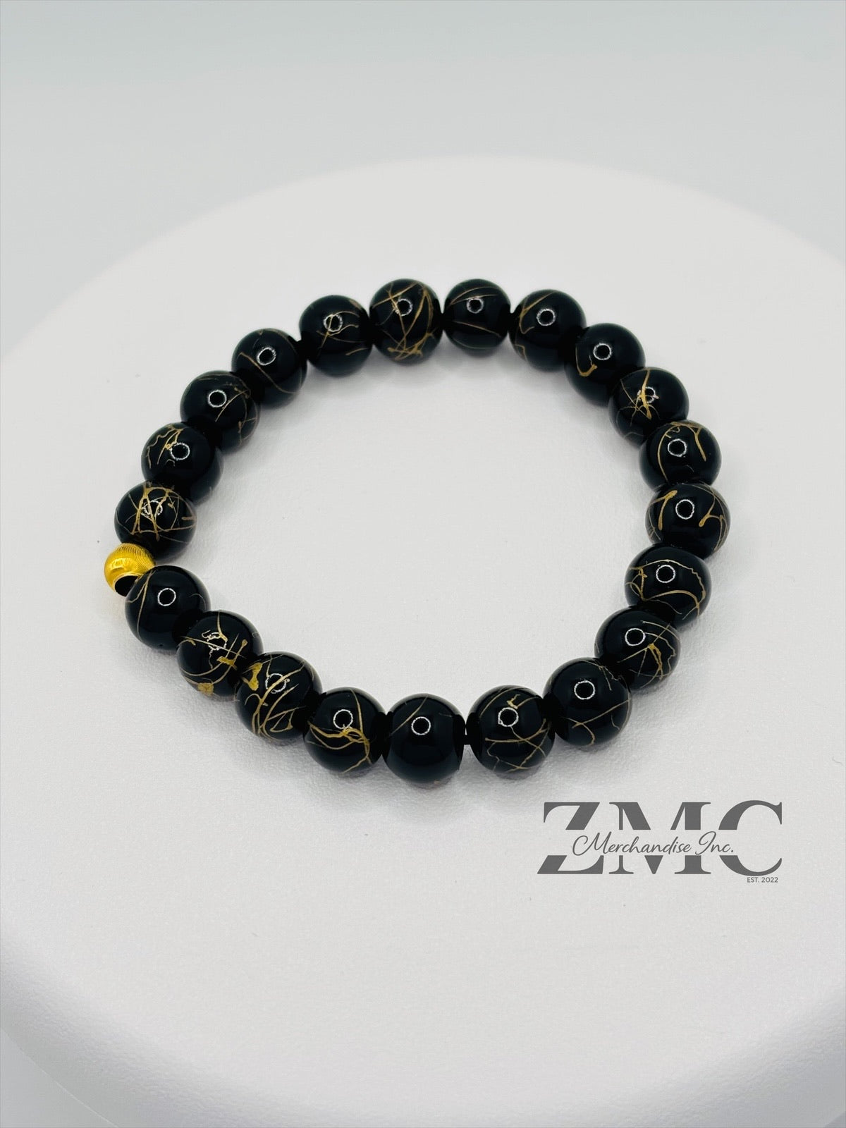 18K Gold Cats Eye Ball with Black Gold Stone