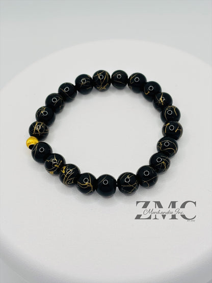 18K Gold Cats Eye Ball with Black Gold Stone