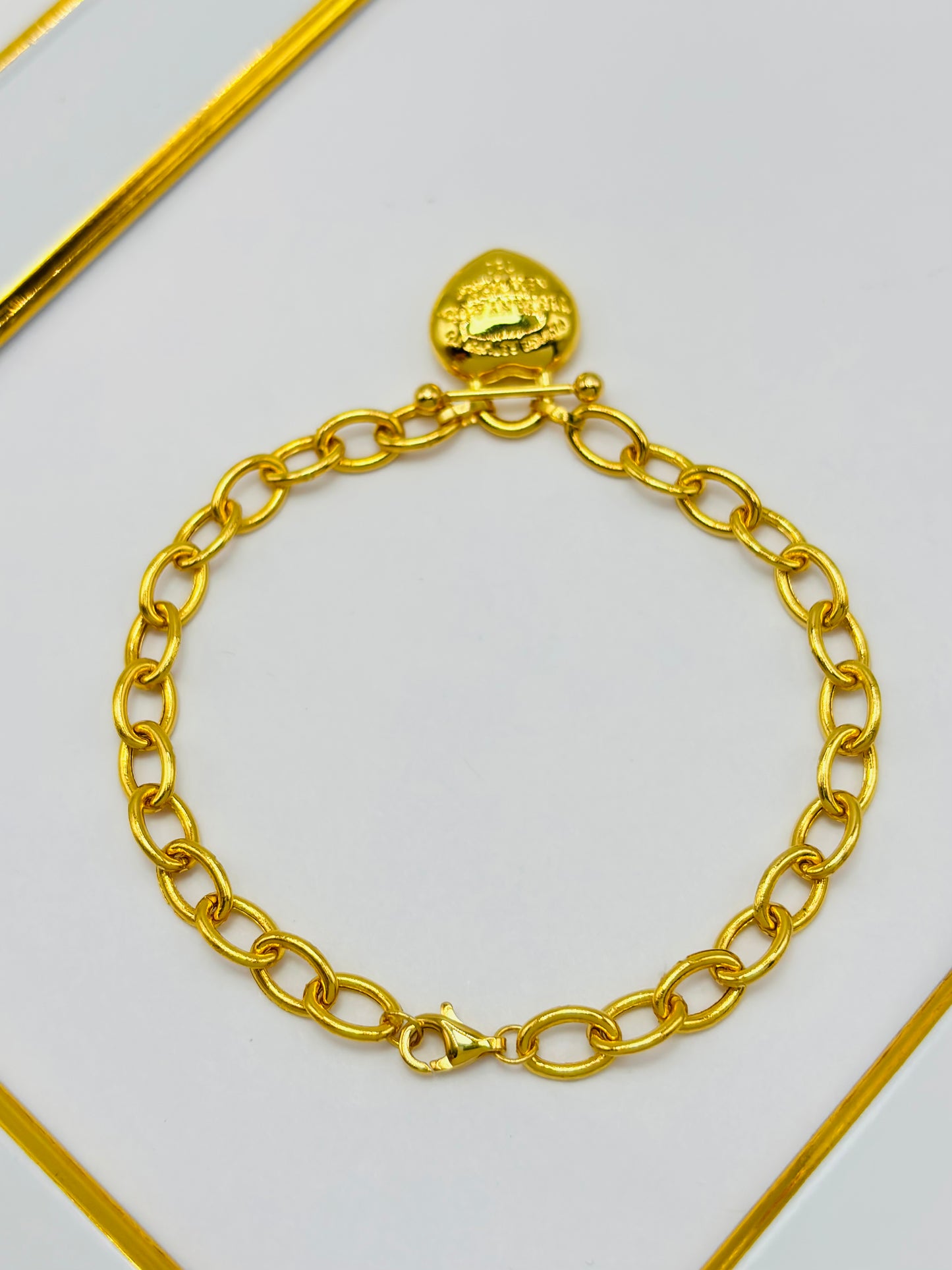 18K Gold with Heart Charm Bracelet
