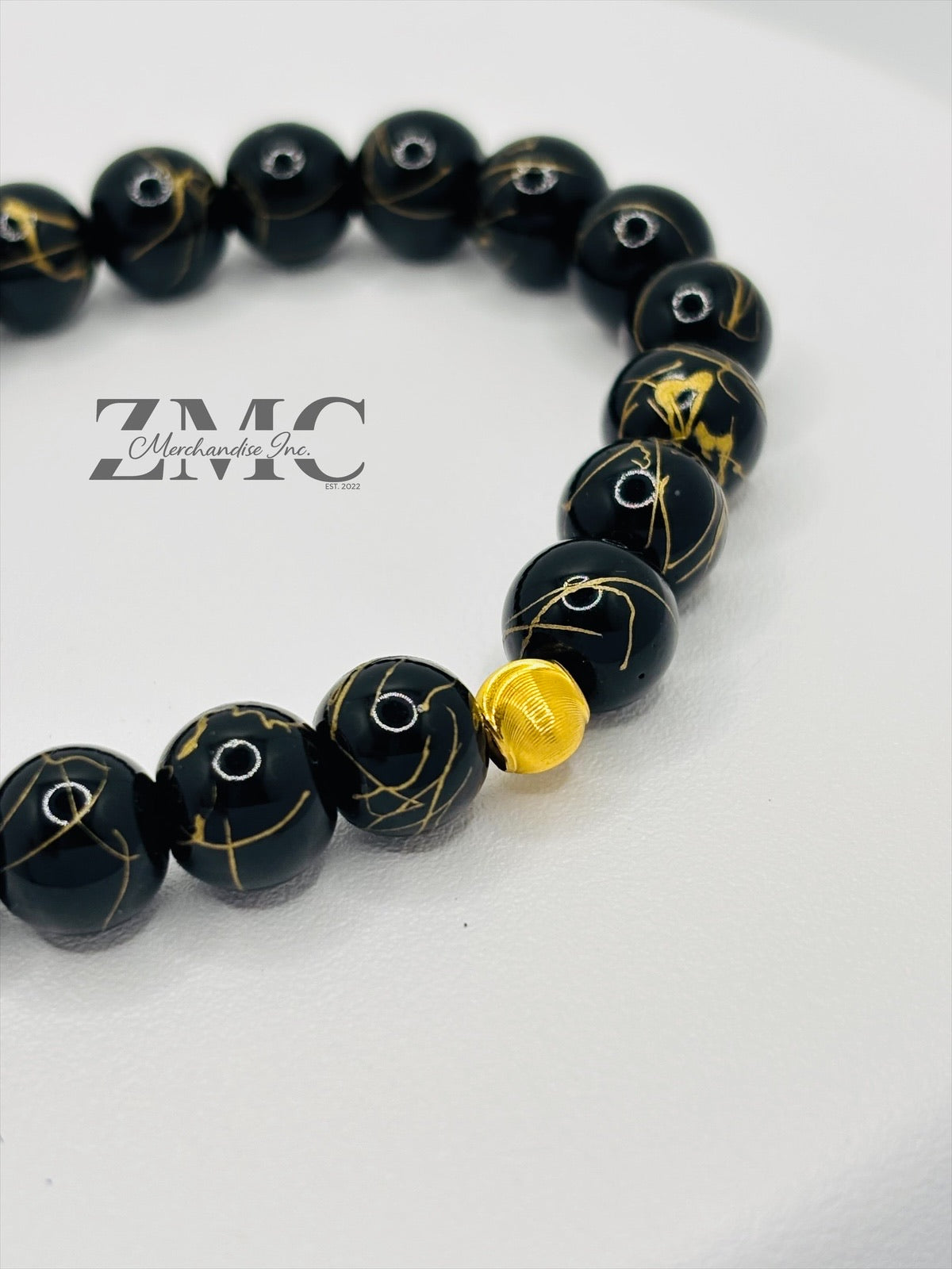18K Gold Cats Eye Ball with Black Gold Stone