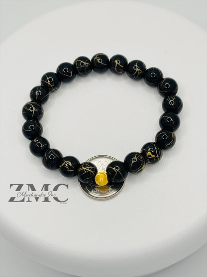 18K Gold Cats Eye Ball with Black Gold Stone