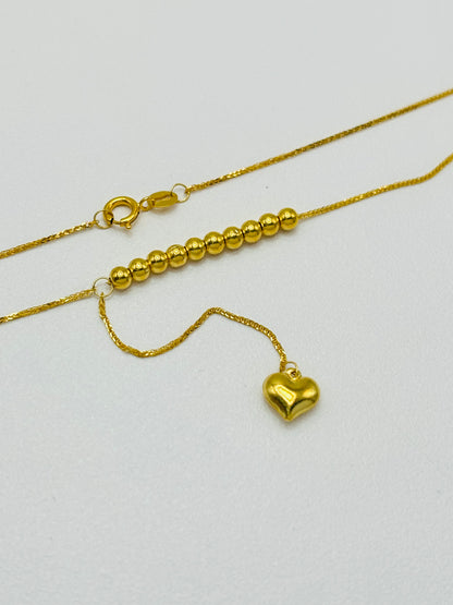 18K Gold Running Ball with Heart Necklace