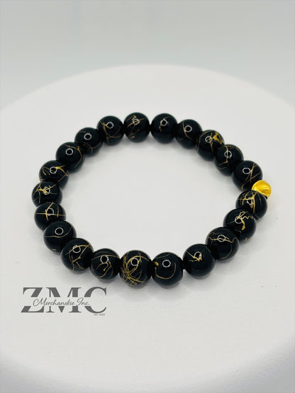 18K Gold Cats Eye Ball with Black Gold Stone